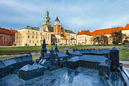 small model of the Royal Castle in Krakow with real buildings in the background, Braille systemのeditorial素材