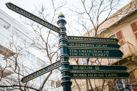 Signpost containing various famous places in the center of Gibraltarの写真素材