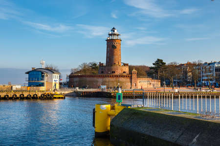 Kolobrzeg, Poland - December 31, 2020: harbor and the lighthouse in Kolobrzeg, West Pomerania, Polandのeditorial素材