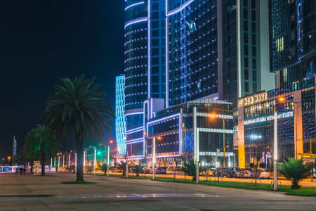 Batumi, Georgia - October 01, 2021: Modern architecture of Batumi embankment at night. Evening view...
