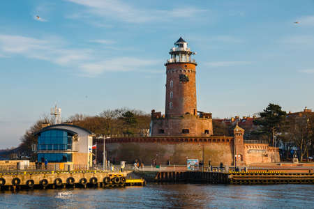 Kolobrzeg, Poland - December 31, 2020: harbor and the lighthouse in Kolobrzeg, West Pomerania, Polandのeditorial素材