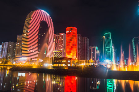 Batumi, Georgia - October 01, 2021: Modern architecture of Batumi embankment at night.のeditorial素材