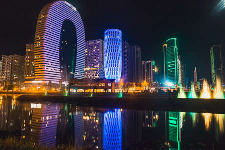 Batumi, Georgia - October 01, 2021: Modern architecture of Batumi embankment at night.のeditorial素材