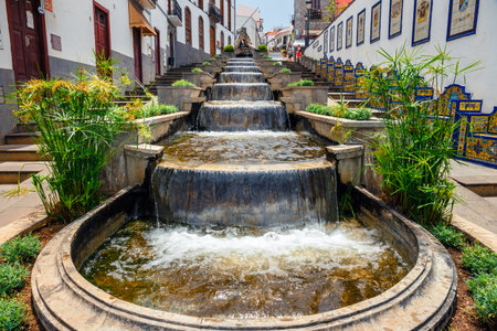 Firgas, Gran Canaria, Spain, July 19, 2022: famous Paseo de Canarias street on Firgas, Gran Canaria, Canary Islands, Spainfamous Paseo de Canarias street on Firgas, Gran Canaria, Canary Islands, Spainのeditorial素材