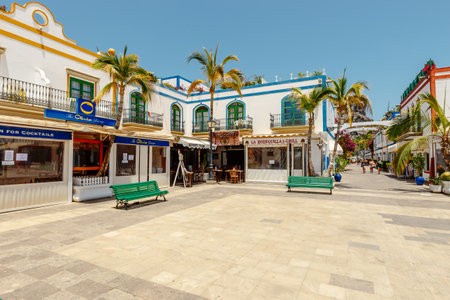 Puerto de MogÃ¡n, Gran Canaria, Spain. 18 July 2022: Narrow and flowery streets of Puerto de Mogan are eagerly visited by touristsのeditorial素材