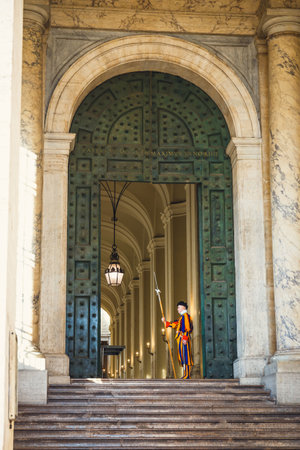Vatican city, Rome - Nov 24, 2023: Papal Swiss Guard in uniform. Currently, the name Swiss Guard generally refers to the Pontifical Swiss Guard of the Holy See stationed at the Vatican in Romeのeditorial素材