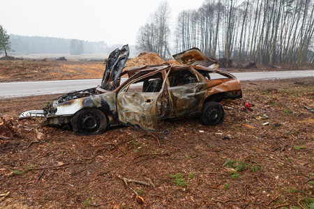 Burned car wreckの写真素材