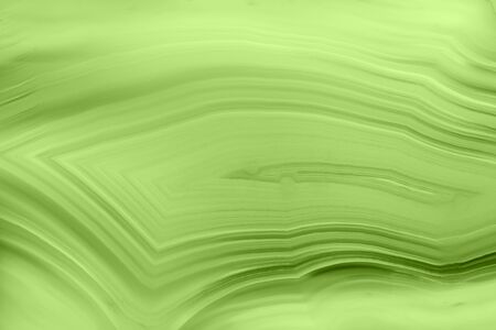 Abstract background - green agate slice macro mineral (PANTONE 15-0343 greenery)の写真素材