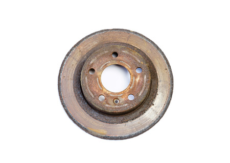 Excessively used rusty brake disc: too thin, covered with rust, with border and with scorched areaの写真素材