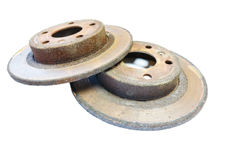 Excessively used rusty brake discs: too thin, covered with rust, with border and with scorched areaの写真素材