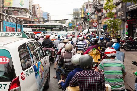 Ho Chi Minh City (Saigon), Vietnam - march 7 2017: heavy traffic on the street. Scooter is most popular mean of transport in Vietnam.のeditorial素材