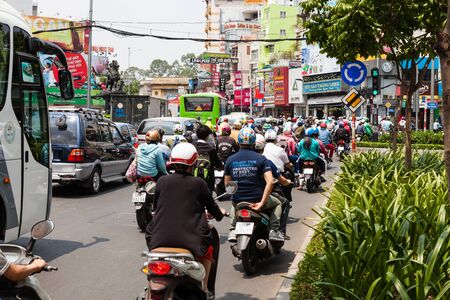 Ho Chi Minh City (Saigon), Vietnam - march 7 2017: heavy traffic on the street. Scooter is most popular mean of transport in Vietnam.のeditorial素材