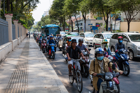 Ho Chi Minh City (Saigon), Vietnam - march 7 2017: heavy traffic on the street. Scooter is most popular mean of transport in Vietnam.のeditorial素材