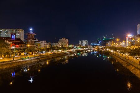Ho Chi Minh City (Saigon), Vietnam - march 7 2017: city by night, view from Cau Ong Lanh bridge towards Nha tho Vinh Hoi catholic churchのeditorial素材