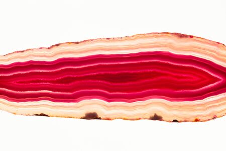 Abstract background - red and yellow agate mineral cross section isolated on white backgroundの写真素材