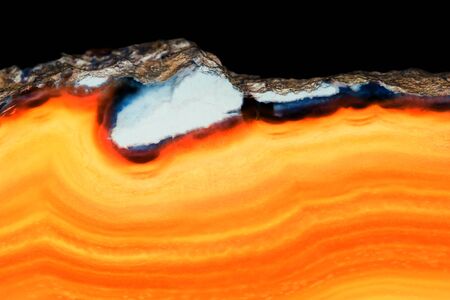 Abstract background - orange agate mineral cross sectionの写真素材