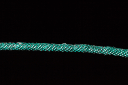 Green fuse on black backgroundの写真素材