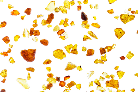 Amber abstract background made of small piecesの写真素材