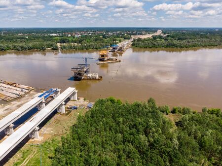 Aerial view of South Bridge construction site over Vistula river, Warsawの写真素材