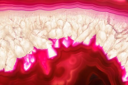 Red orange agate slice striped mineral abstract backgroundの写真素材