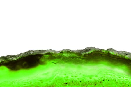 Abstract background, green mineral cross section isolated on white backgroundの写真素材