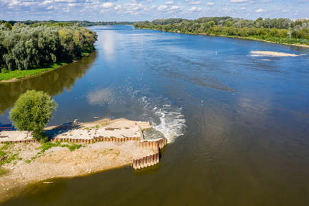Discharge of sewage into the river, ecological disaster after failure of the sewage treatment plant, Warsaw, Polandの写真素材