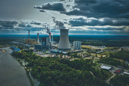Power station under moody cloudy sky aerial viewの写真素材