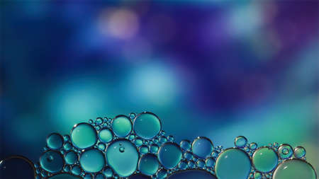 Fantasy colorful blurry background with ornament made of soft clear bubbles, abstract color splashes with copy space, focus on foregroundの写真素材