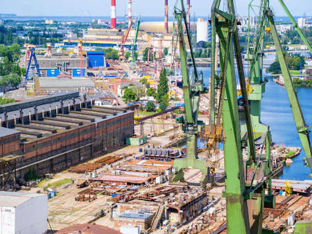 Cranes in Gdansk shipyard, aerial landscapeの写真素材