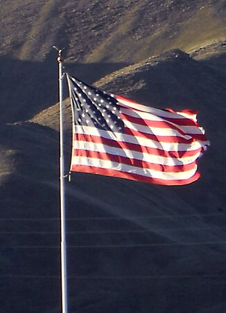 CLARKSTON/WASHINGTON STATE /USA _ United States flag stars and stripes flys back ground Clarkston hills 5 March 2011   のeditorial素材