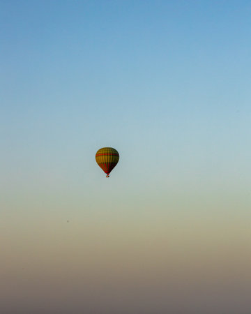 Hot air balloon in the sky at sunset. Colorful hot air balloonの写真素材