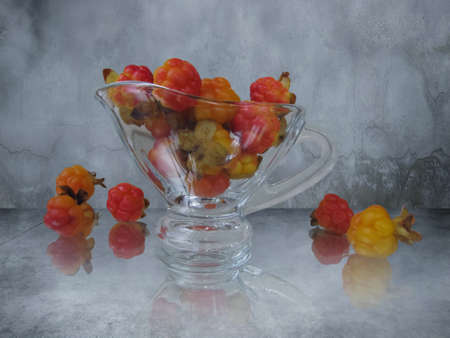 still life with red cloudberryの写真素材