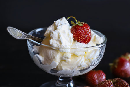 dessert with strawberries and whipped creamの写真素材