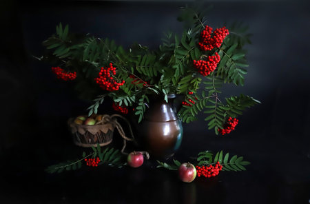 - still life, mountain ash in a vase on a black backgroundの写真素材