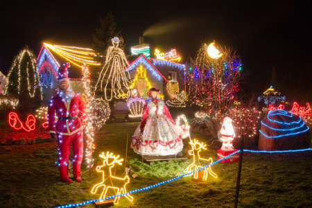 POLKOWICE - DECEMBER 24: The most beautifully decorated in the town house of Mrs. and Mr. Duszenko  on December 24, 2012 in Polkowice, Poland. For the decoration was used of 50 thousand lights.のeditorial素材