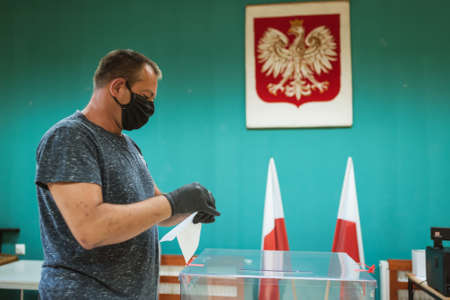 SCINAWA, POLAND - JUNE 28, 2020: The voter during elections for president of Poland.