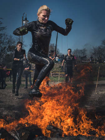 WROCLAW, POLAND - APRIL 7; 2018: Extreme running with obstacle RUNMAGEDDON. In the picture a runner on the Recruit route.のeditorial素材
