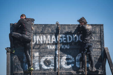 WROCLAW, POLAND - APRIL 7; 2018: Extreme running with obstacle RUNMAGEDDON. In the picture a runner on the Recruit route.のeditorial素材