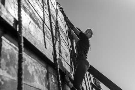 WROCLAW, POLAND - APRIL 7; 2018: Extreme running with obstacle RUNMAGEDDON. In the picture a runner on the Recruit route.のeditorial素材
