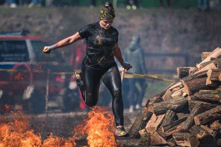 WROCLAW, POLAND - APRIL 7; 2018: Extreme running with obstacle RUNMAGEDDON. In the picture a runner on the Recruit route.のeditorial素材