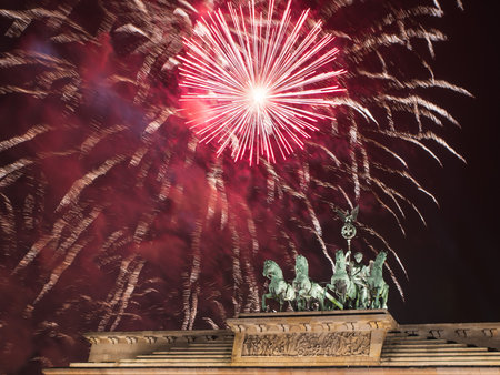 Fireworks over the Brandenburg Gate in Berlin, Germany, during New Year concert and celebrations.の写真素材