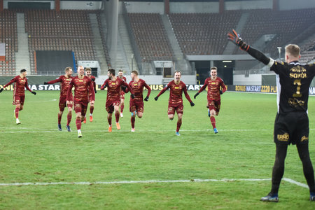 LUBIN, POLAND - FEBRUARY 11, 2021: Football match Fortuna Polish Cup between KGHM Zaglebie Lubin - Chojniczanka Chojnice 0: 0 (4: 5). Joy team of Chojniczanka with goalkeeper Pawel sokol after penalty shoots.のeditorial素材