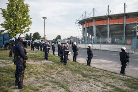 LUBIN, POLAND - SEPTEMBER 15, 2021: Police units in front of the stadium before Ekstraklasa football match KGHM Zaglebie Lubin - Pogon Szczecin.のeditorial素材
