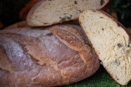 Traditional homemade breads loaves, sectioned and whole