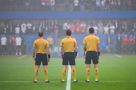 Referees before the match in the middle of field.の写真素材