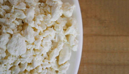 plate of fresh cottage cheese. Healthly food. Organic cottage cheese. Keto diet. Macro. View from above. Copyspaceの写真素材