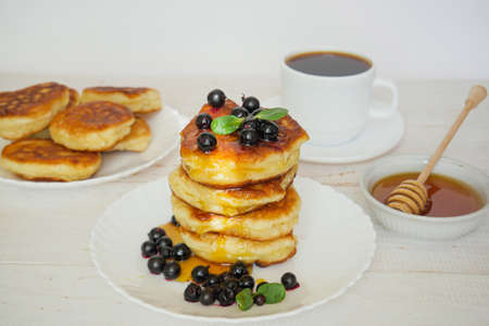 Pancakes. Stack of pancakes topped with roses jam butter. Breakfast.Pancakes. Stack of pancakes topped with roses jam butter. Breakfast. Pancakes. Pancakes. Pancakes.の写真素材