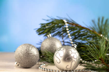 Christmas decorations with pine tree on wooden tableの写真素材