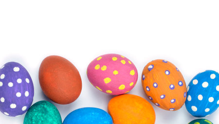 Easter eggs. Happy Easter card. Multicolored Easter eggs. Easter. Easter eggs on a white wooden...
