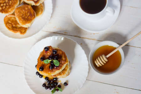 Pancakes. A stack of pancakes with pink butter jam. Breakfast.Pancakes. A stack of pancakes with berries and honey butter. Breakfast Pancakes. Pancakes. view from above. copyspaceの写真素材